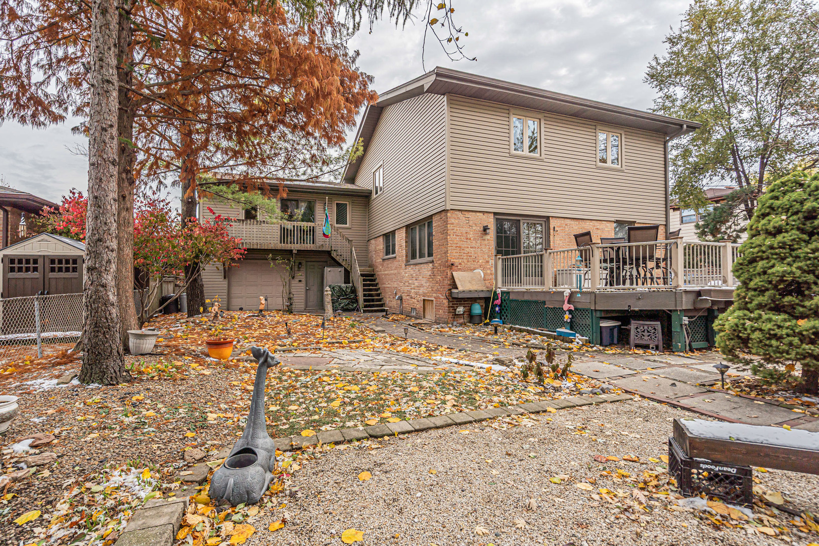 6528 Ridge Drive Chicago Ridge, IL 60415 - Photo 20 of 33 a front view of a house with a yard