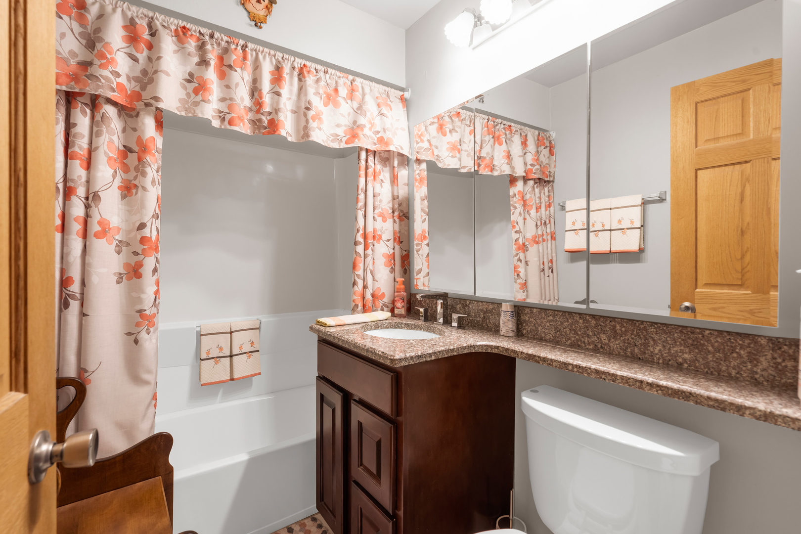 6528 Ridge Drive Chicago Ridge, IL 60415 - Photo 22 of 33 a bathroom with a granite countertop sink a toilet and a mirror