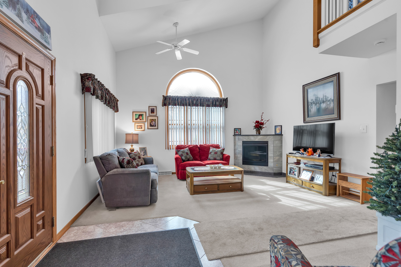 6528 Ridge Drive Chicago Ridge, IL 60415 - Photo 6 of 33 a living room with furniture a fireplace and a flat screen tv