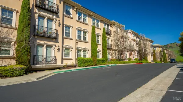 a kitchen with stainless steel appliances granite countertop a stove and a refrigerator