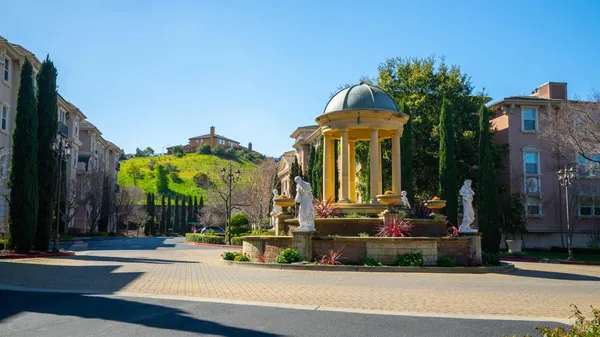 front view of a building with a street