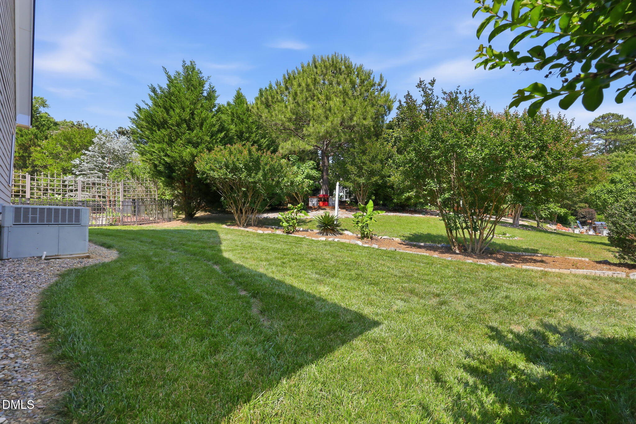 7040 Dayton Ridge Drive Apex, NC 27539 - Photo 32 of 38 a view of a park with trees and grass