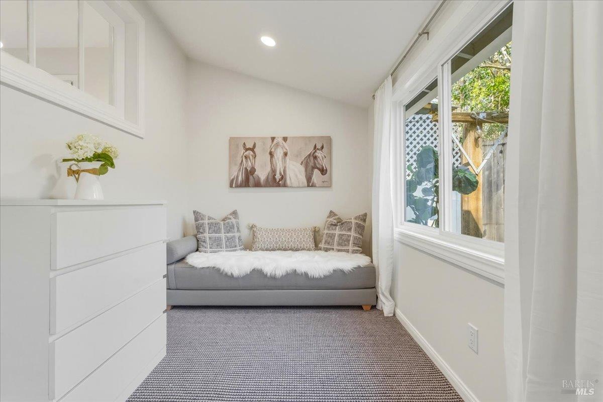 250 Butterfield Road San Anselmo, CA 94960 - Photo 14 of 28 a bedroom with a bed and a painting on the wall