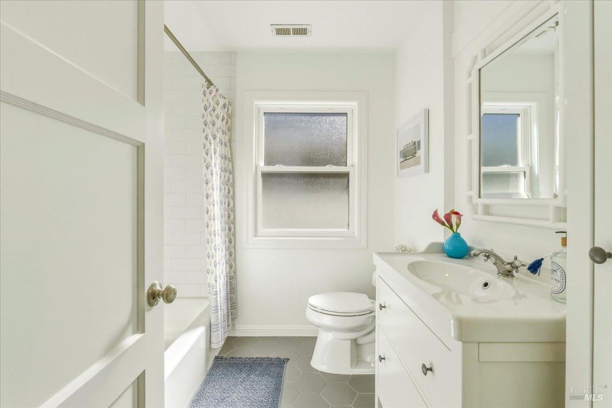 250 Butterfield Road San Anselmo, CA 94960 - Photo 15 of 28 a bathroom with a sink toilet and shower