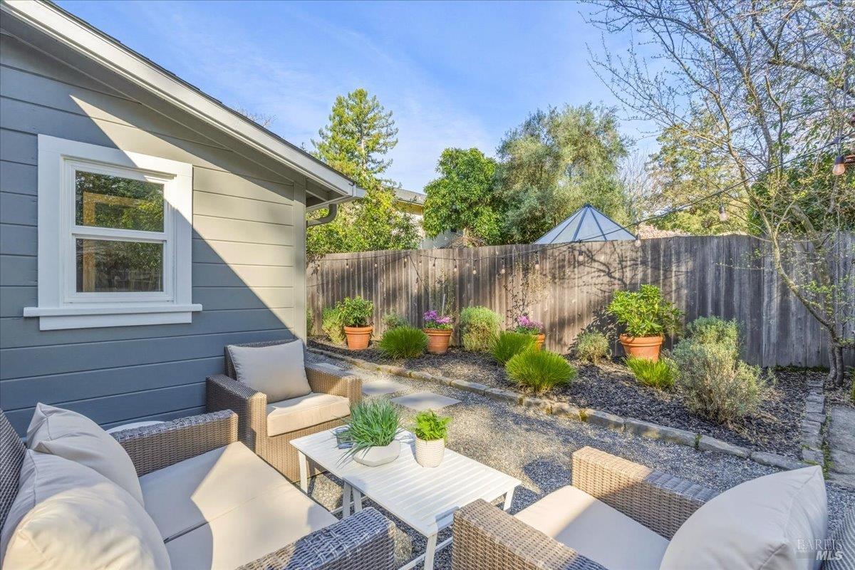 250 Butterfield Road San Anselmo, CA 94960 - Photo 22 of 28 a view of backyard with outdoor seating and plants