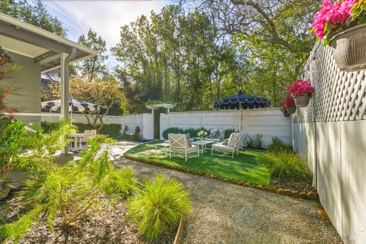 250 Butterfield Road San Anselmo, CA 94960 - Photo 23 of 28 a view of a backyard with sitting area