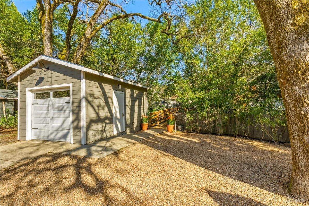250 Butterfield Road San Anselmo, CA 94960 - Photo 26 of 28 a view of an house with backyard and trees