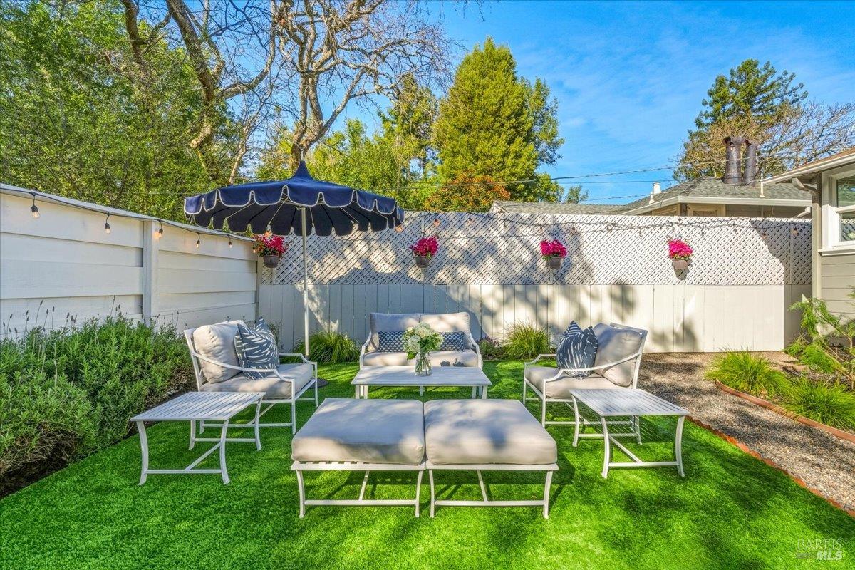 250 Butterfield Road San Anselmo, CA 94960 - Photo 5 of 28 a view of backyard with seating space and trees