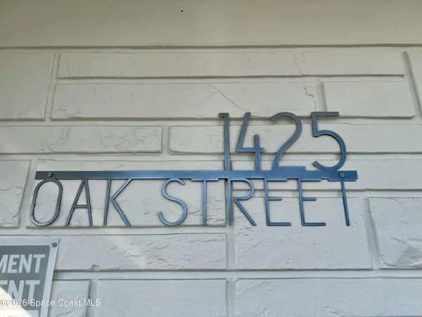 a kitchen with stainless steel appliances granite countertop a refrigerator a sink and dishwasher