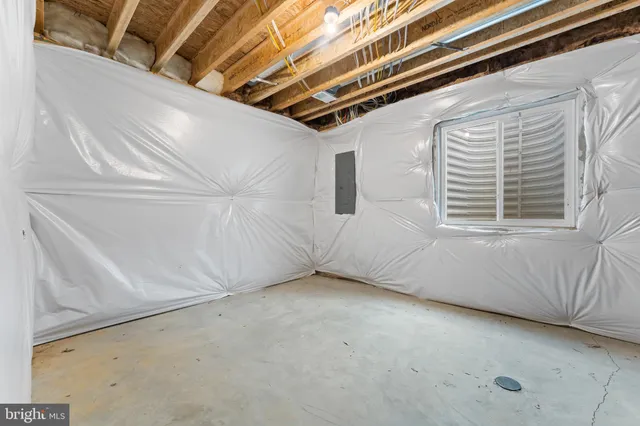 a view of a room with windows