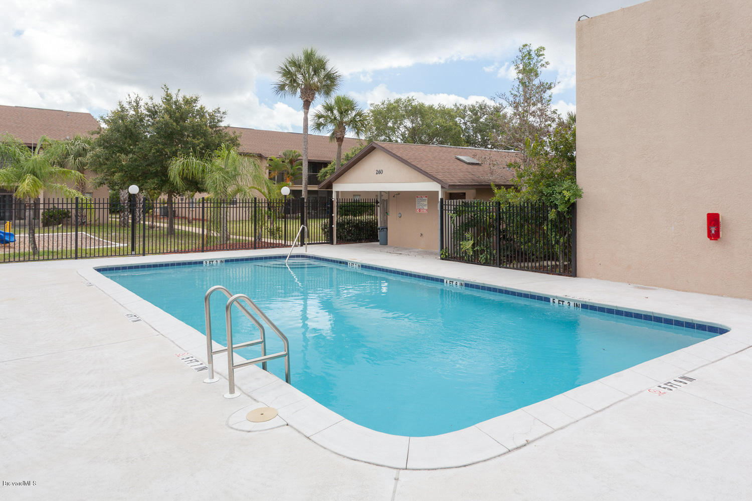 210 Spring Drive, Unit 5 Merritt Island, FL 32953 - Photo 14 of 17 Community Pool