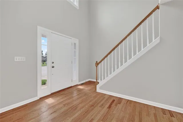 a kitchen that has a sink and a stove in it
