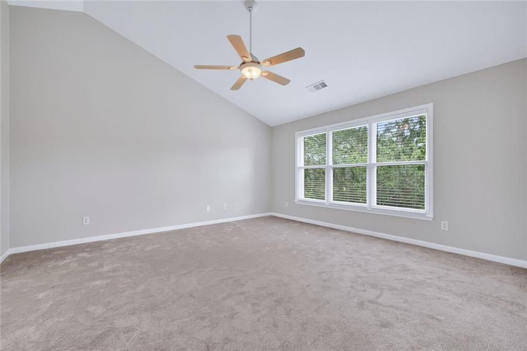 641 Olde Ivy Way Stone Mountain, GA 30087 - Photo 17 of 40 a view of an empty room with a window
