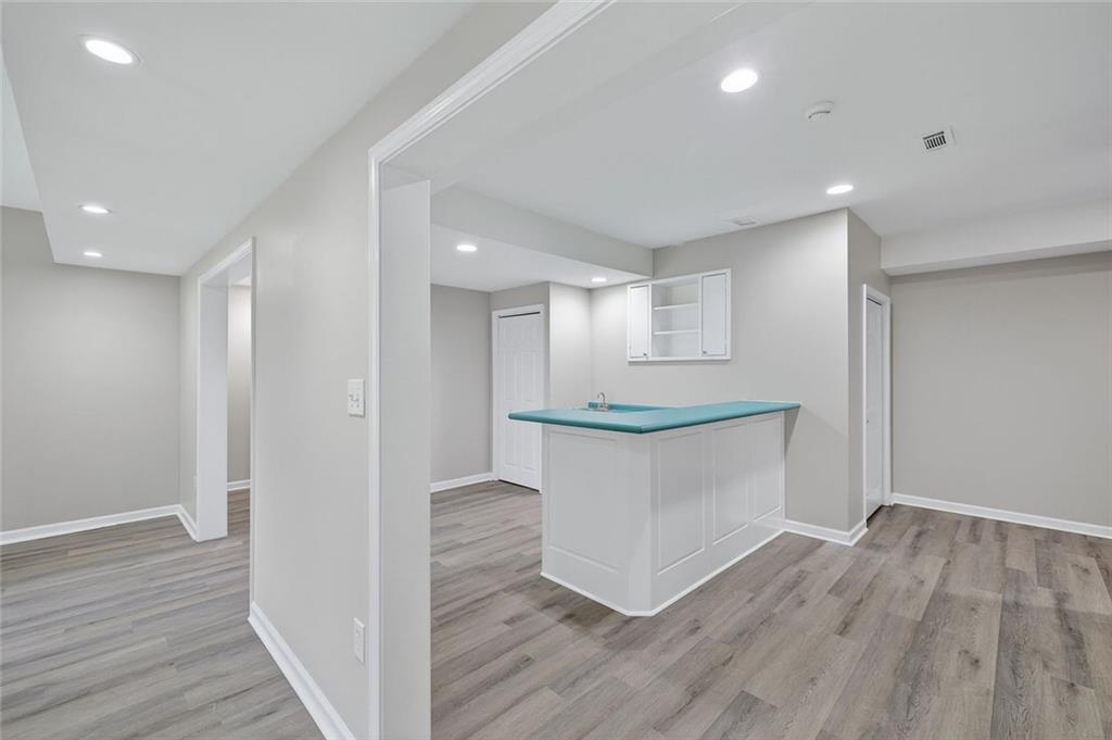 641 Olde Ivy Way Stone Mountain, GA 30087 - Photo 26 of 40 a view of kitchen with wooden floor