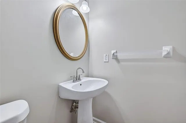 a view of balcony with wooden floor and fence