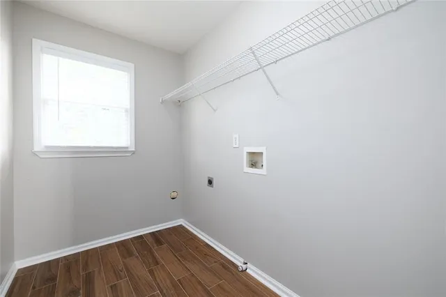 a picture of a bench in front of a window