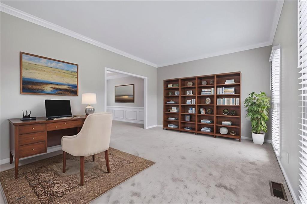641 Olde Ivy Way Stone Mountain, GA 30087 - Photo 8 of 40 a view of a workspace with furniture and a window