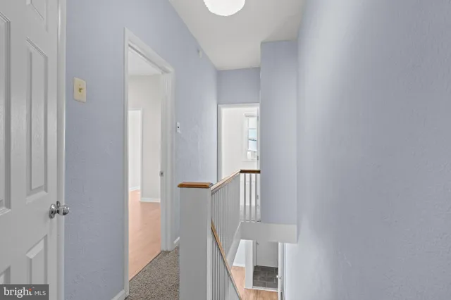 a view of a livingroom from a hallway