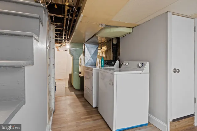 a utility room with dryer and washer
