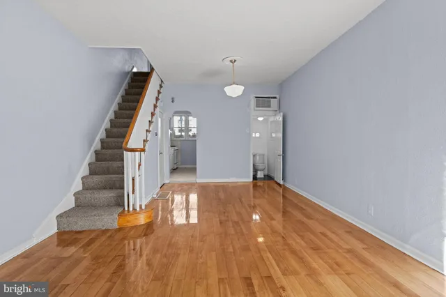 a view of entryway with wooden floor
