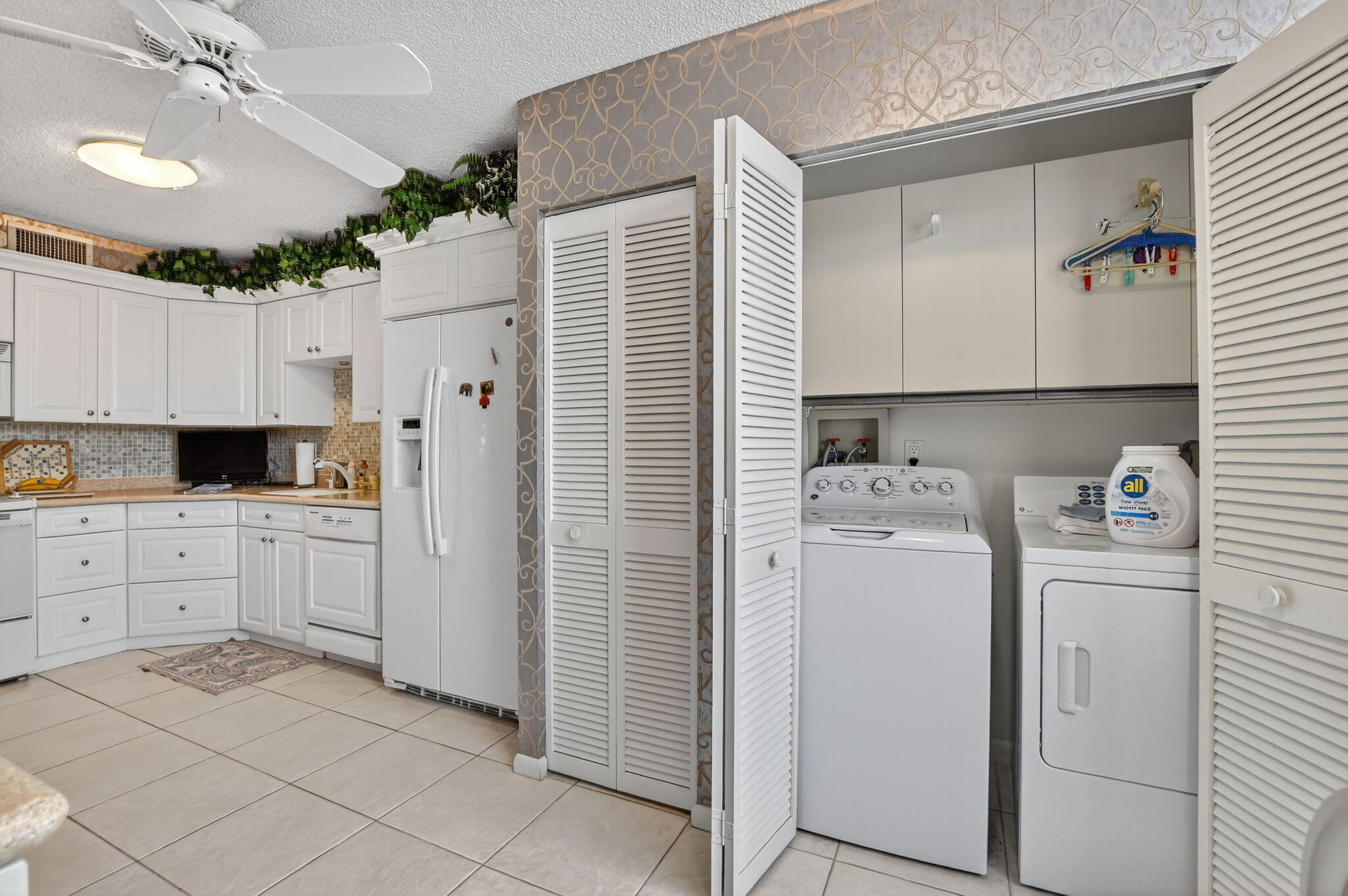 7178 Promenade Drive, Unit 502 Boca Raton, FL 33433 - Photo 16 of 33 kitchen/laundry