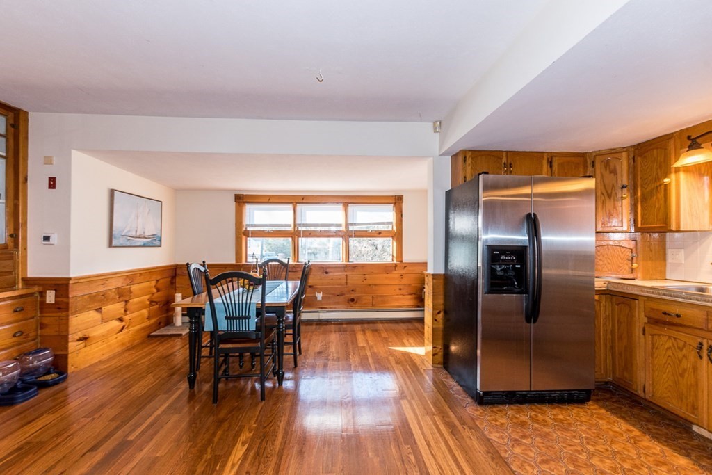 19 Cahoon Road Wareham, MA 02532 - Photo 11 of 34 a view of a dining room with furniture window and wooden floor