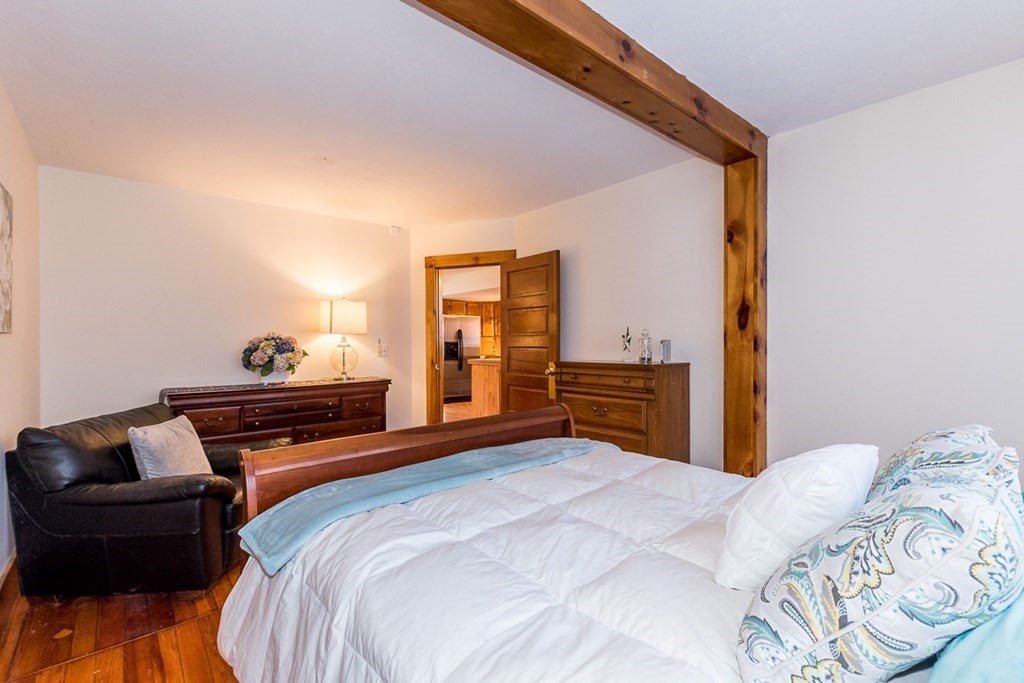 19 Cahoon Road Wareham, MA 02532 - Photo 18 of 34 a bedroom with a bed and a couch