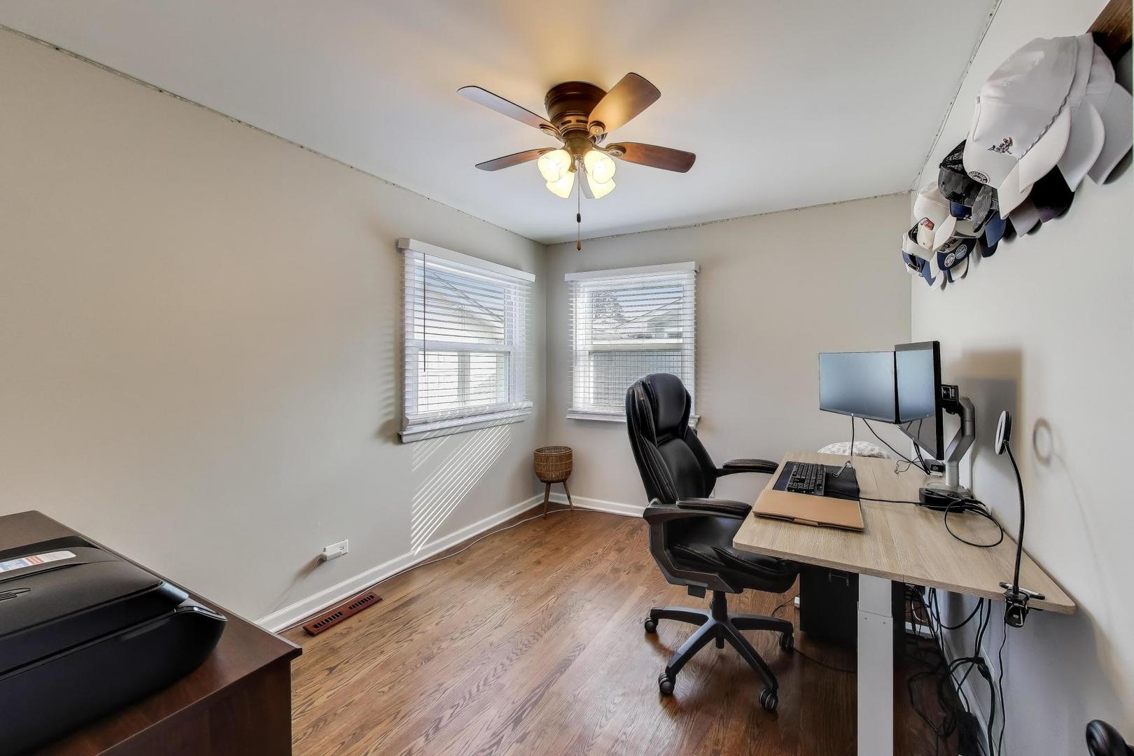 906 Hickory Lane Naperville, IL 60540 - Photo 12 of 30 a workspace with furniture and a window