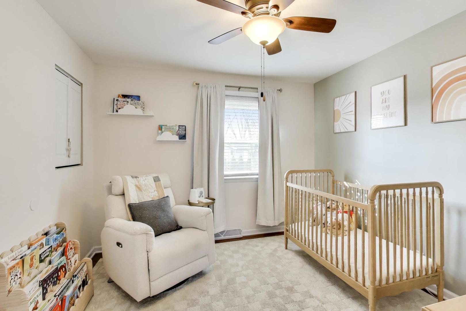 906 Hickory Lane Naperville, IL 60540 - Photo 17 of 30 a living room with furniture and a chandelier