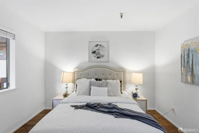 a view of a bathroom with a sink and mirror
