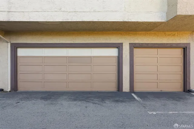 a view of a door and wooden door