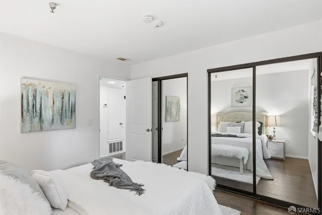 a bathroom with a toilet sink and shower