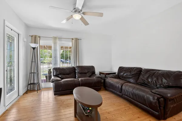 a living room with furniture and a window