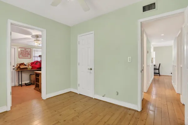 a utility room with stainless steel appliances kitchen island granite countertop a stove and a sink