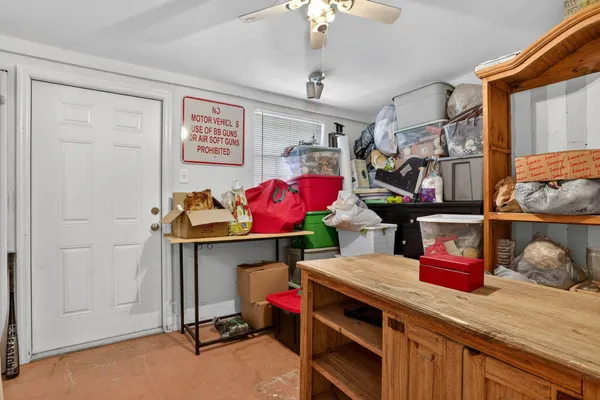 a view of a garden with a building in the background