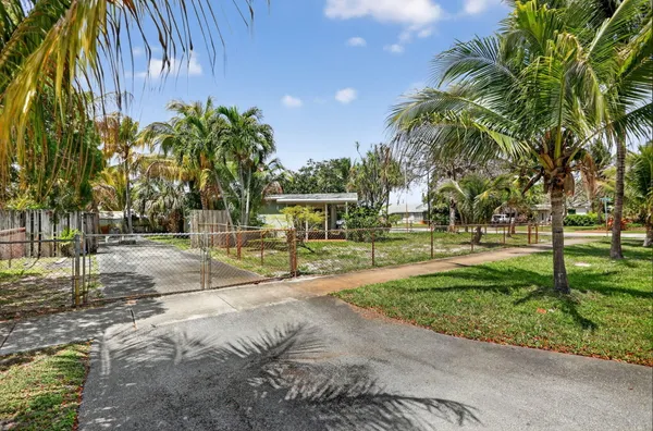 a view of a park with swings