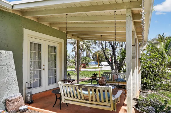 front view of a house with a patio