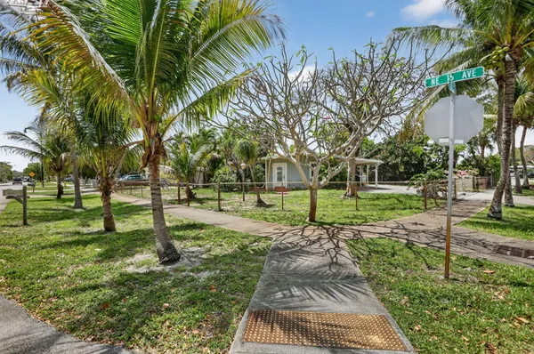 a kitchen with stainless steel appliances granite countertop wooden cabinets a sink and dishwasher