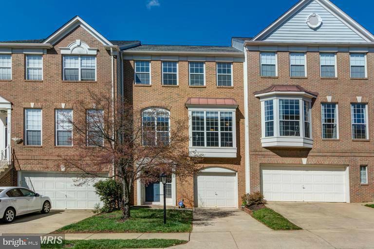 20927 Trinity Square Sterling, VA 20165 - Photo 1 of 23 Charming brick townhouse with elegant details.
