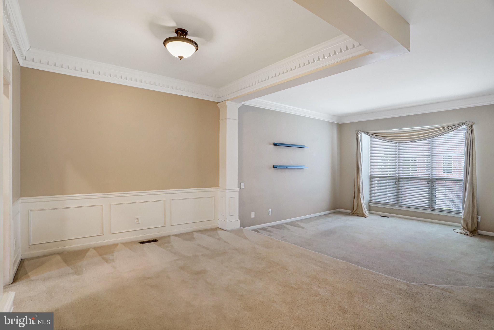 20927 Trinity Square Sterling, VA 20165 - Photo 16 of 47 a view of an empty room with a window