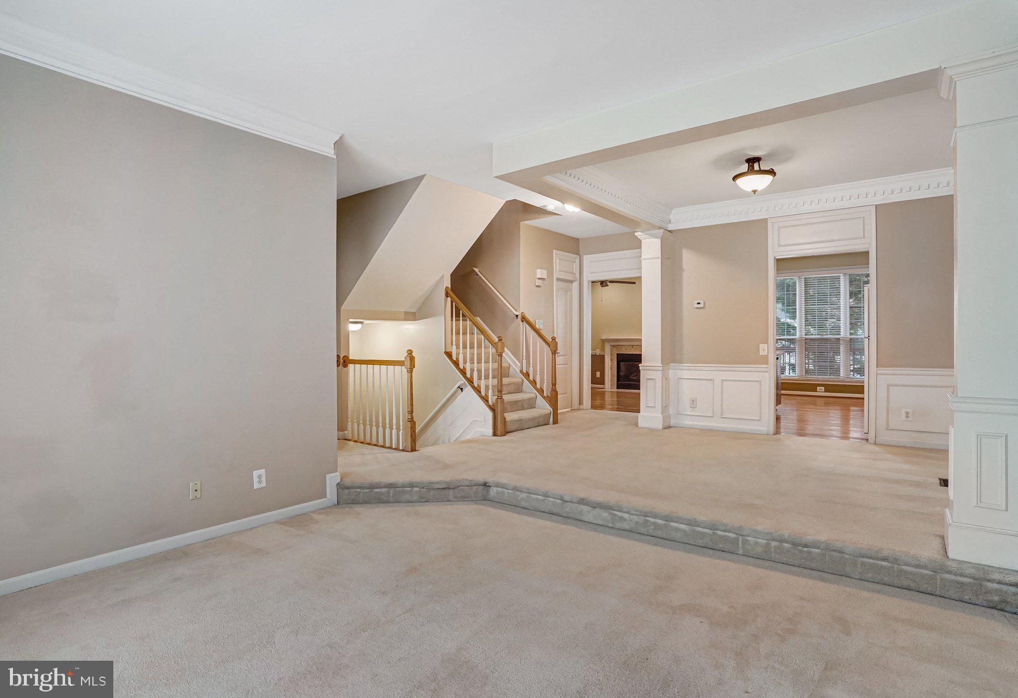 20927 Trinity Square Sterling, VA 20165 - Photo 18 of 47 a view of an empty room with stairs