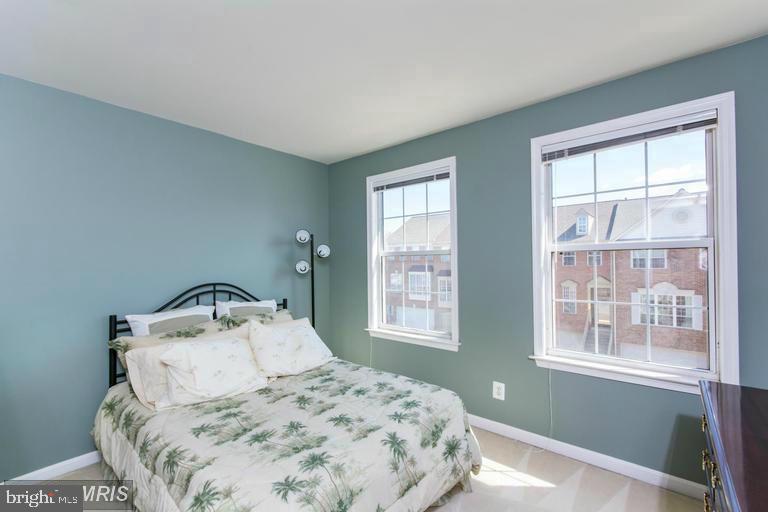 20927 Trinity Square Sterling, VA 20165 - Photo 18 of 23 Bright and airy bedroom with natural light.