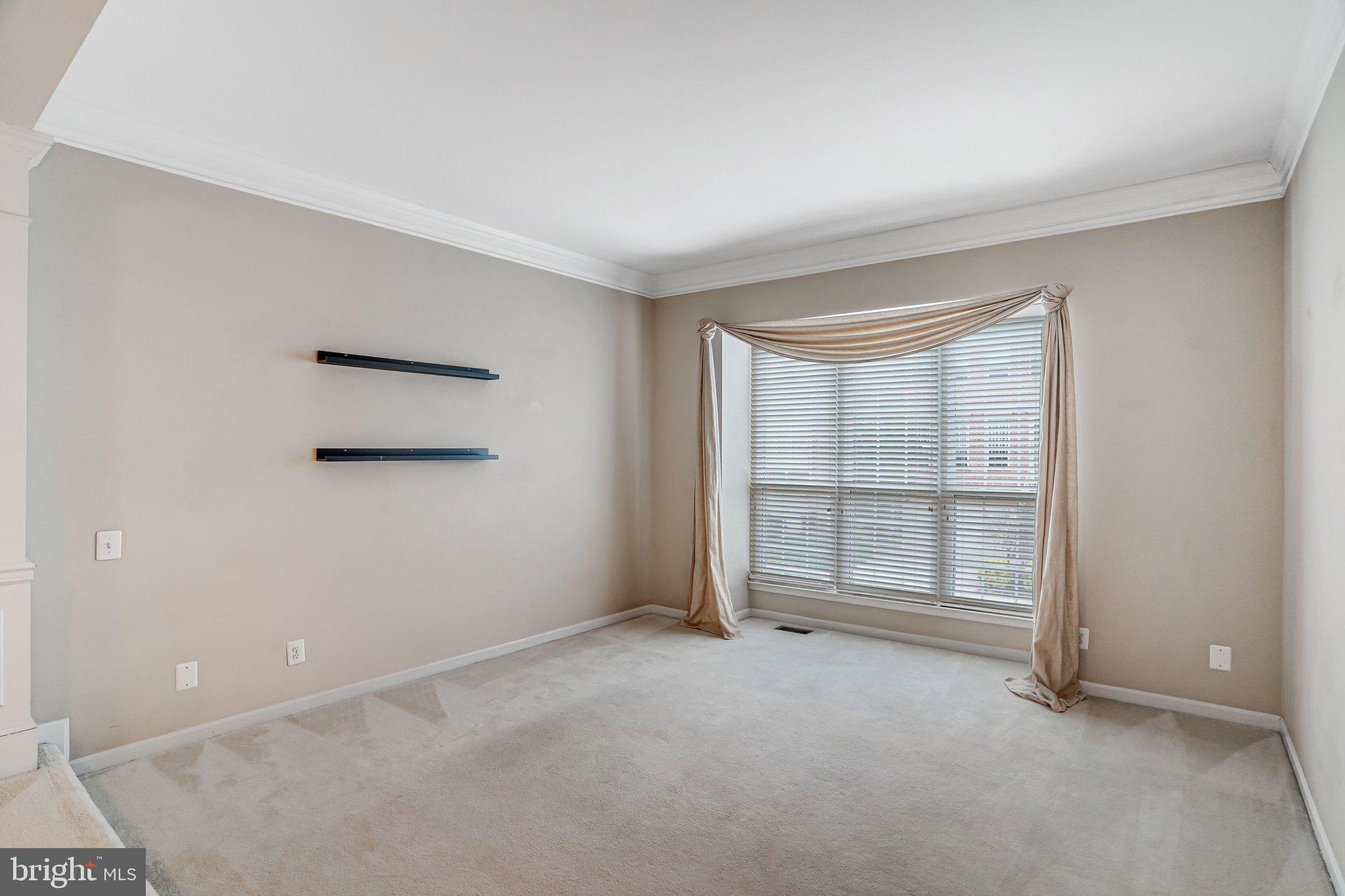 20927 Trinity Square Sterling, VA 20165 - Photo 19 of 47 an empty room with windows