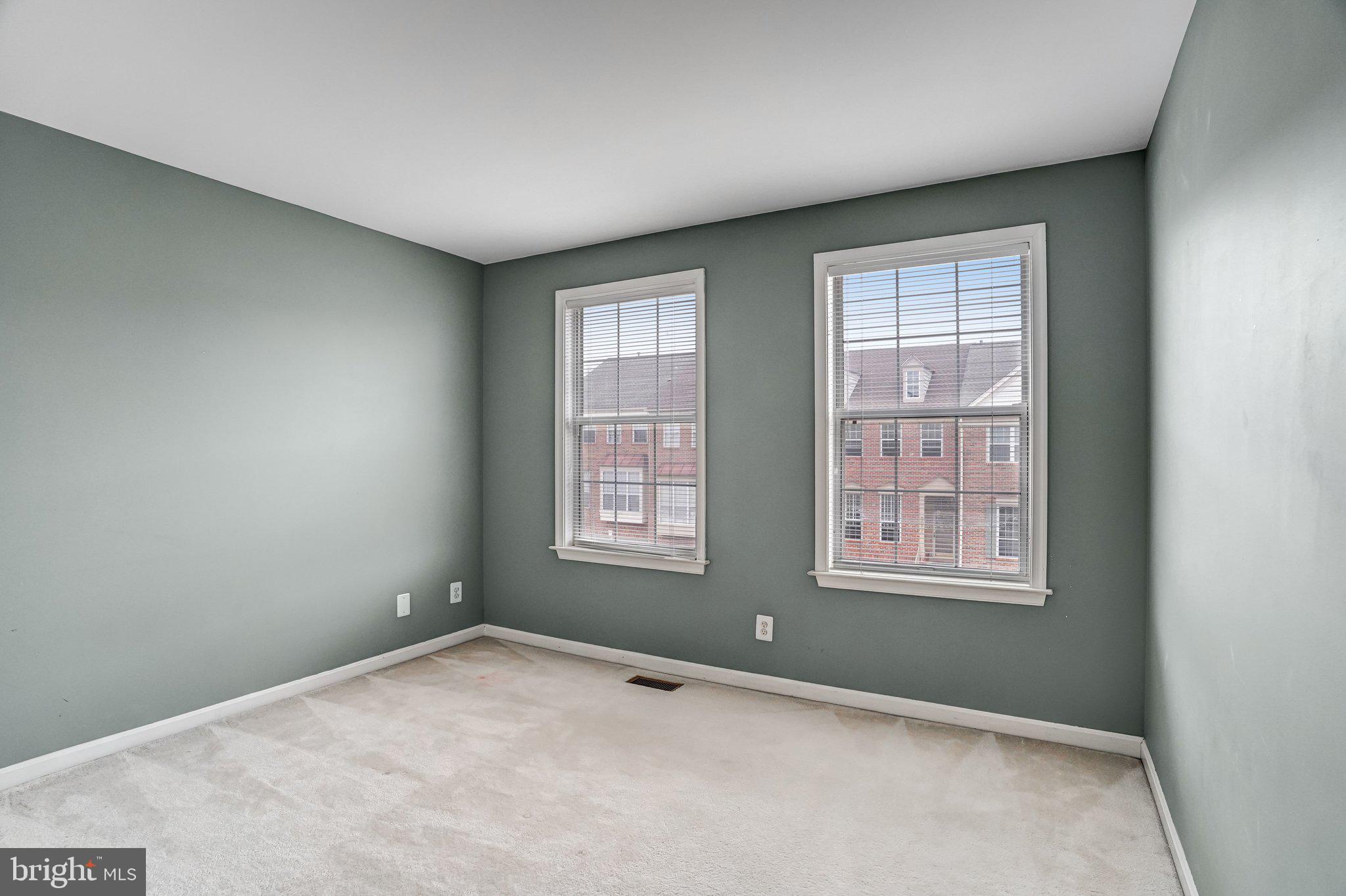 20927 Trinity Square Sterling, VA 20165 - Photo 28 of 47 an empty room with windows