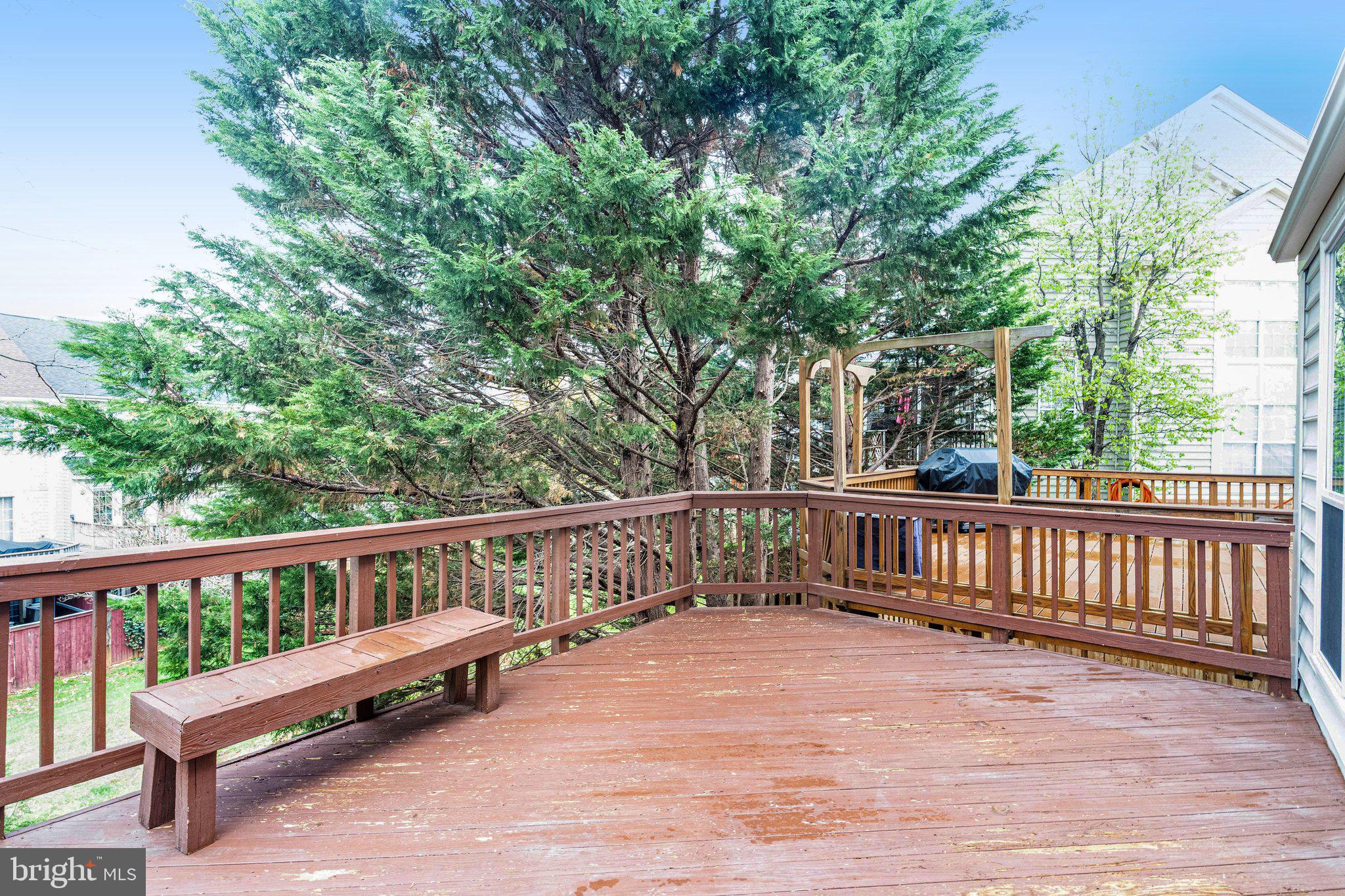 20927 Trinity Square Sterling, VA 20165 - Photo 35 of 47 a view of a wooden deck