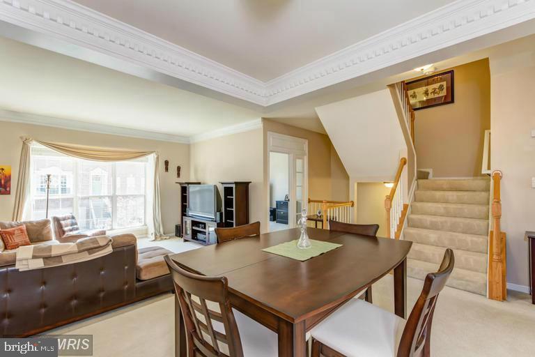 20927 Trinity Square Sterling, VA 20165 - Photo 9 of 23 Spacious living area with elegant design.