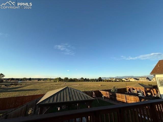 11329 Avena Road Peyton, CO 80831 - Photo 2 of 42 a view of a balcony with an ocean view