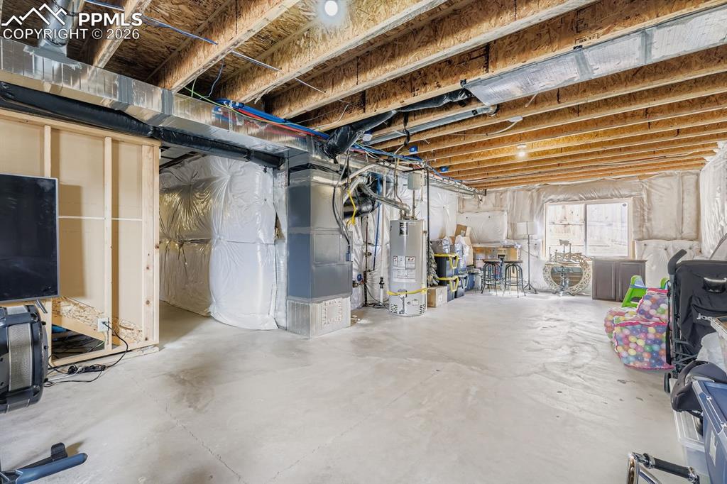 11329 Avena Road Peyton, CO 80831 - Photo 22 of 42 a view of a room with gym equipment