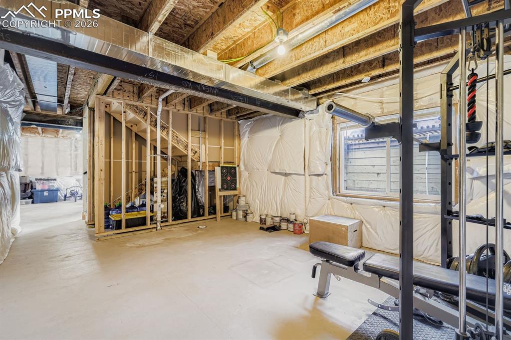 11329 Avena Road Peyton, CO 80831 - Photo 23 of 42 a view of a room with gym equipment