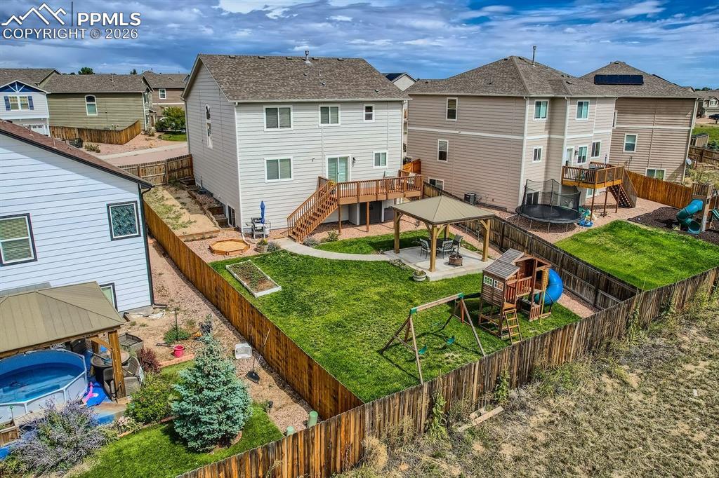 11329 Avena Road Peyton, CO 80831 - Photo 36 of 42 a view of a house with backyard